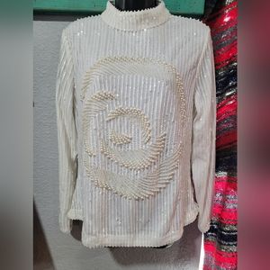 Beautiful sweater with jeweled details